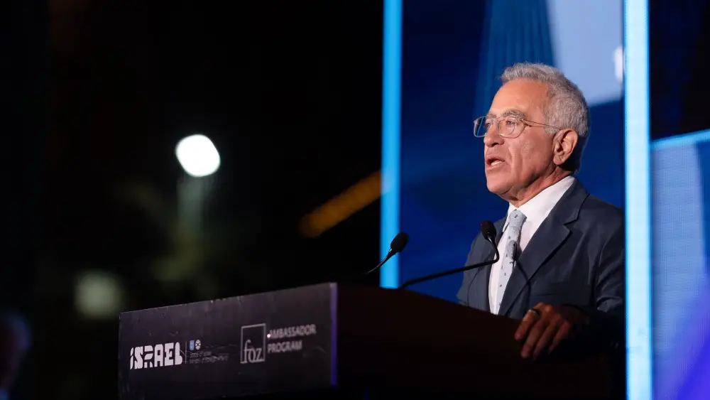 Sylvan Adams addresses a gathering of evangelical Christian pastors in Jerusalem on October 7, 2026. Credit: Roy Yehuda/FOZ.