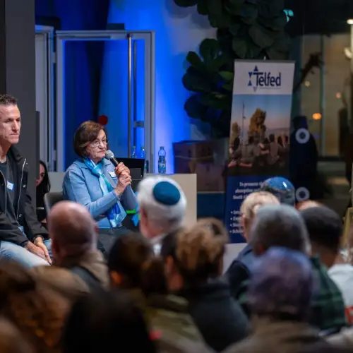 Dudu Baron and Carol Goldfus talk to Benita Levin about caring for wounded IDF soldiers at the Telfed event in Herzliya, Dec. 30, 2025. Photo by Brian Spector.