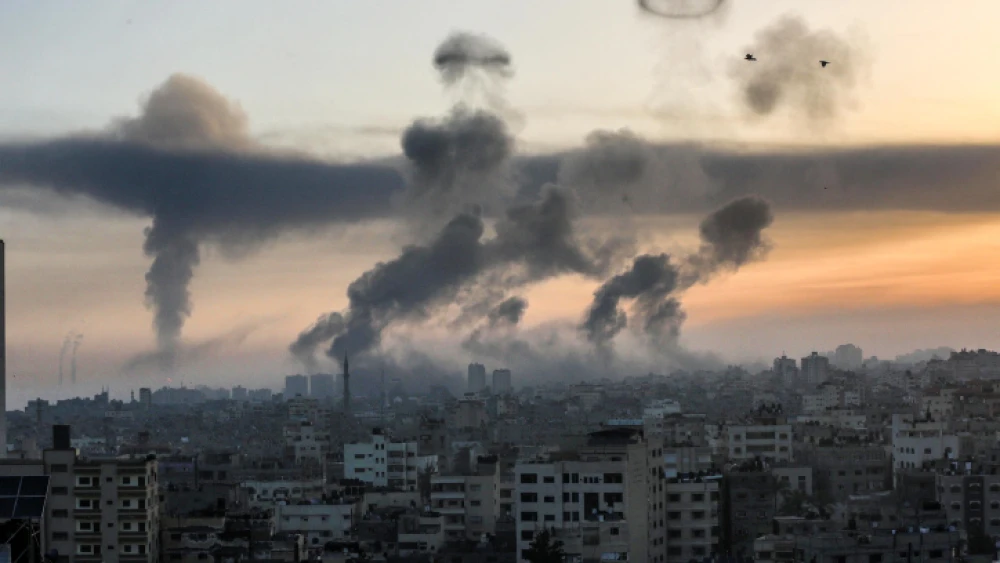 Smoke rise following an Israeli airstrike in Gaza City, on May 12, 2021. Photo by Atia Mohammed/Flash90.