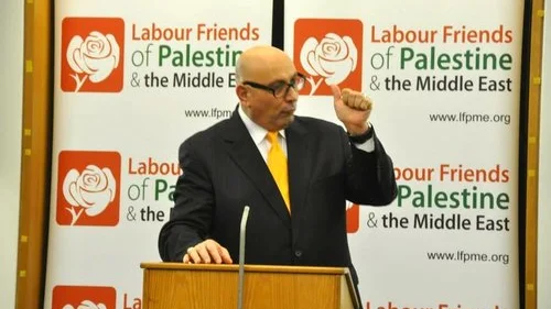 Manuel E. Hassassian, the Palestinian Authority’s chief envoy in London, speaks at an event hosted by a pro-Palestinian British lobby group. Credit: Labour Friends of Palestine & the Middle East via Facebook.