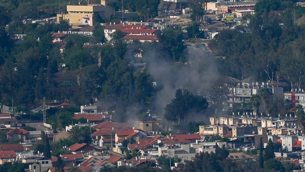 Smoke rises from a building hit by a rocket from Lebanon in Kiryat Shmona, Israel on April 16, 2026.