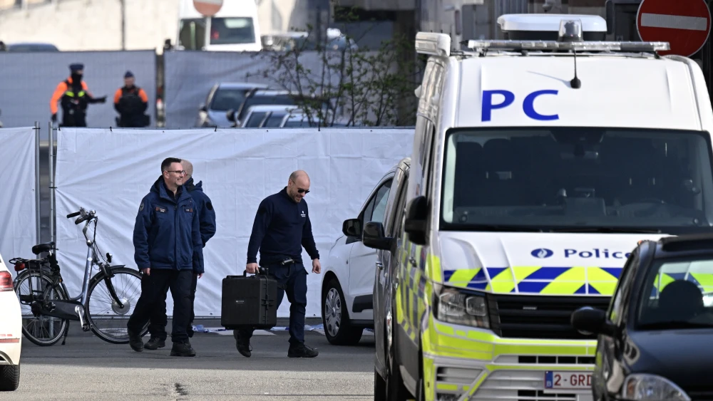 Belgian police investigate outside a Liège synagogue after it was hit by a blast, March 9, 2026. Photo by John Thys/AFP via Getty Images.
