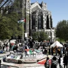 Students and supporters of the pro-Palestinian movement listen to a speaker during a demonstration at an encampment set up early in the morning at the CUNY Harlem campus on April 25, 2024 in New York City. Similar demonstrations are sweeping the country’s colleges and universities demanding that school officials divest from companies that have a stake in the Israeli economy. (Photo by John Lamparski/Getty Images.