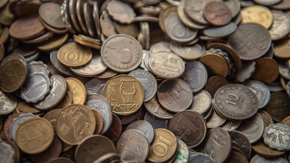 Old Israeli coins. Photo by Yahav Gamliel/Flash90.