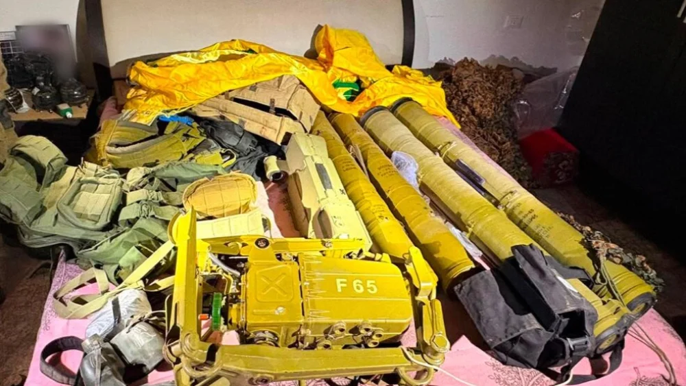 A cache of Hezbollah weapons hidden inside a bedroom of a civilian home in Tallousa in South Lebanon uncovered by the IDF, July 7, 2026. Credit: IDF.