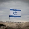 An Israeli flag in the E1 area of Ma'ale Adummim in Judea, Jan. 2, 2017. Photo by Yonatan Sindel/Flash90.