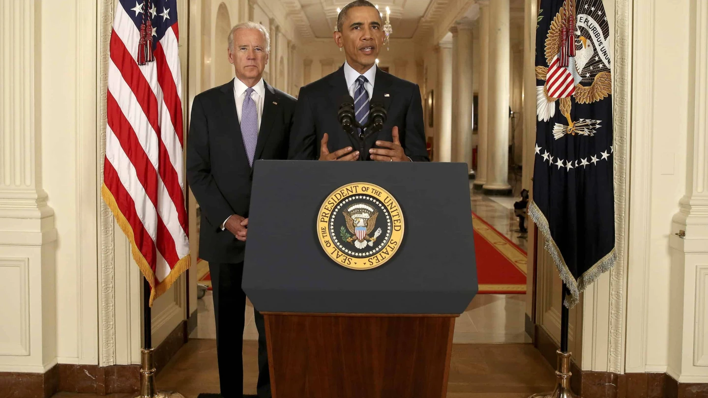 President Barack Obama, standing with Vice President Joe Biden, conducts a press conference in the East Room of the White House on the Iran nuclear deal on July 14, 2015. Photo by Andrew Harnik/POOL via Getty Images.