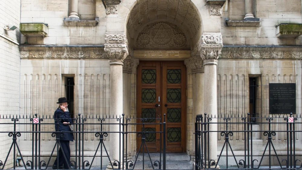 An Orthodox Jewish man outside a synagogue in the Jewish Quarter in Antwerp, Belgium, on Dec. 9, 2014. Photo by Johanna Geron/Flash90.