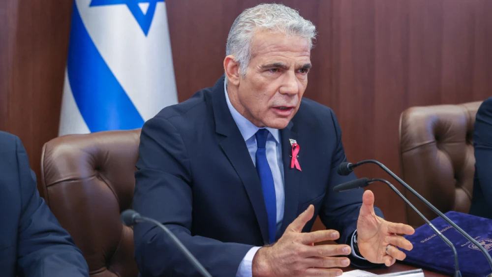 Israeli Prime Minister Yair Lapid leads a Cabinet meeting at the Prime Minister's Office in Jerusalem on Oct. 2, 2022. Photo by Amit Shabi/POOL.