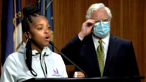 Activist Tamika Mallory with Jefferson County Attorney Mike O’Connell of Kentucky at a press conference following the Breonna Taylor grand jury verdict in mid-September 2020. Source: Screenshot.