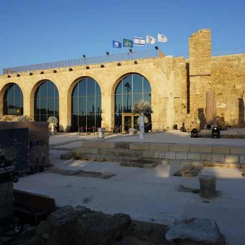 The new Visitor Center in Caesarea combines artifacts with innovative displays, including a 10-minute film telling the story of Herod and the building of Caesarea projected vertically onto one of the huge vault walls, May 2019. Photo by Judy Lash Balint.