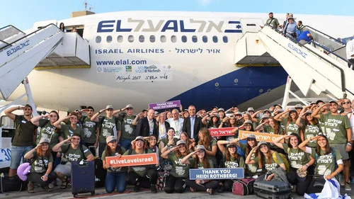 Future IDF soldiers are pictured upon their arrival in Israel Aug. 15 on a flight chartered by the Nefesh B’Nefesh aliyah agency. Credit: Shahar Azran.