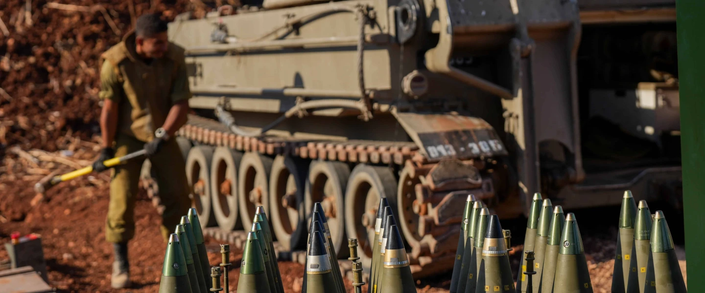 Israeli soldiers seen next to their artillery units near the Israeli border with Lebanon, northern Israel, Oct. 2, 2024. Photo by Ayal Margolin/Flash90.