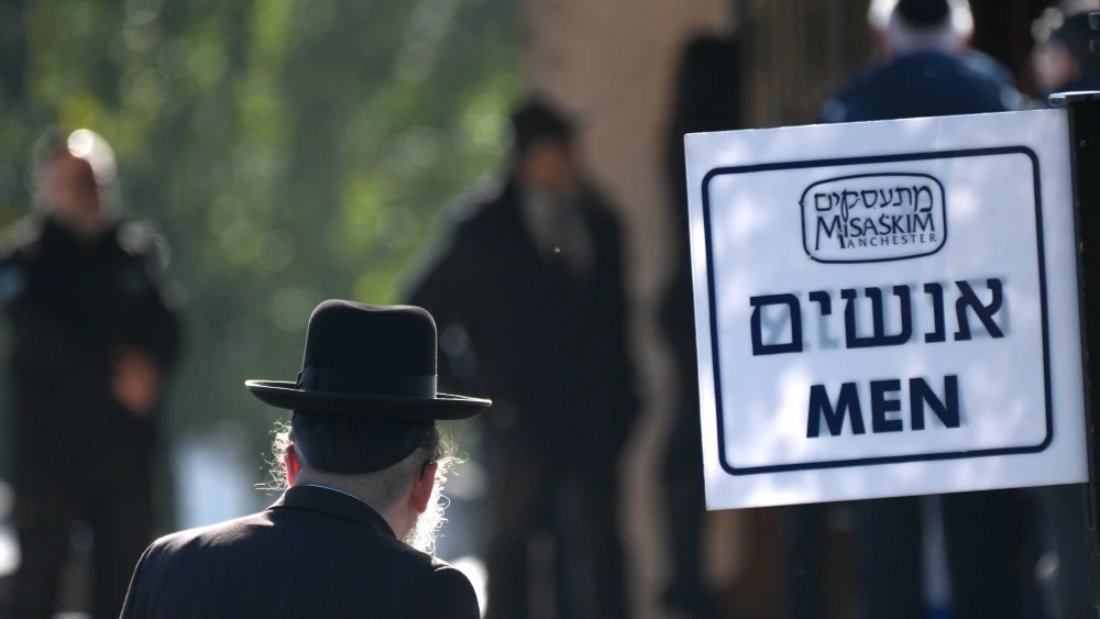 A Jewish man attends a funeral in Manchester in Salford, England, the U.K. on Oct. 6, 2025. Photo by Christopher Furlong/Getty Images.