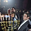 Relatives of the Hyper Cacher terrorist attack victims (Philippe Braham, Yohan Cohen, Yoav Hattab, and François-Michel Saada) light Hanukkah candles at this week's “Let There Be Light: A Concert of Jewish Unity” at the Grande Synagogue de la Victoire (the Great Synagogue of Paris). Credit: Israel Bardugo.
