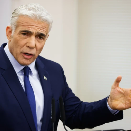 Then-Foreign Minister Yair Lapid speaks during a faction meeting at the Knesset, May 9, 2022. Photo by Olivier Fitoussi/Flash90.