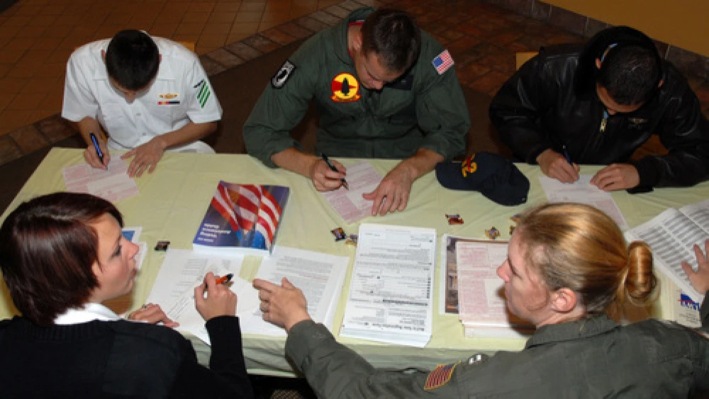 Members of the U.S. Navy register to vote in American elections in Oak Harbor, Wash., on Sept. 4, 2008. While more than 80 percent of eligible Jewish voters participate in American presidential elections, less than 1 percent voted in the recent nationwide election among American Jews for delegates to the World Zionist Congress. Credit: U.S. Navy Photo by Mass Communication Specialist 2nd Class Tucker M. Yates/Released.