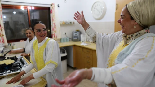 Israelis prepare moufletta for Mimouna, in Moshav Ahi'ezer, April 3, 2021. Photo by Tomer Neuberg/Flash90.