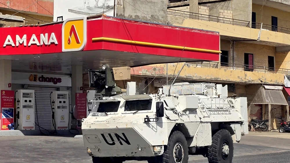 A vehicle of the United Nations Interim Force in Lebanon (UNIFIL) moves along a street in Lebanon's southern coastal city of Tyre on March 18, 2026. Photo by Kawnat HAJU / AFP via Getty Images.