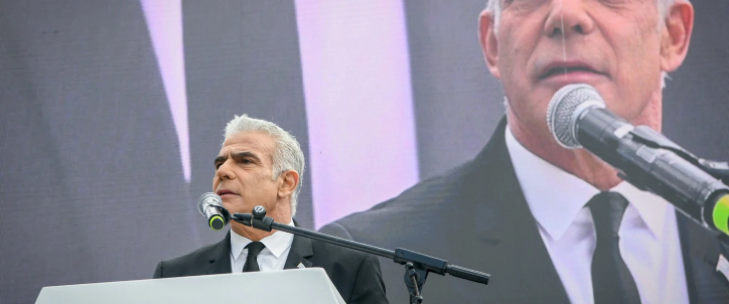 Opposition leader Yair Lapid speaks at a protest outside the Knesset in Jerusalem against the government's judicial reform plan, Feb. 13, 2023. Photo by Arie Leib Abrams/Flash90.