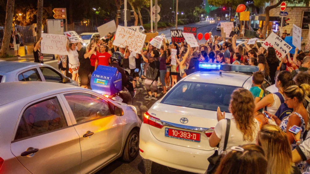Parents protest with their children against the lack of oversight in Israeli kindergartens, in Haifa, July 7, 2019. Photo by Flash90.