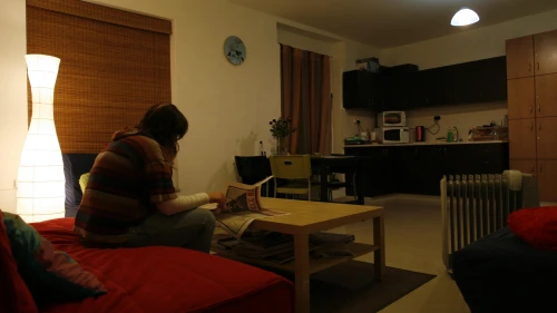 A girl sits in a flat serving as a shelter for youth at risk, operated by the ELEM voluntary association, on March 1, 2008. Photo by Anna Kaplan/ Flash90.