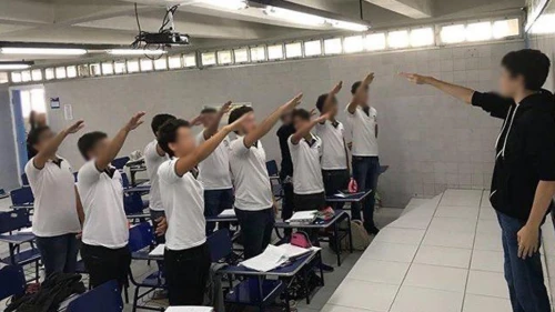 A group of 11 high school senior students in Brazil performed the Nazi salute in class. Credit: Instagram Screenshot.