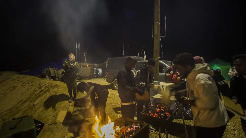 Eritrean volunteers prepare the feast near the Gaza border, Jan. 16, 2024. Photo by Rina Castelnuovo.
