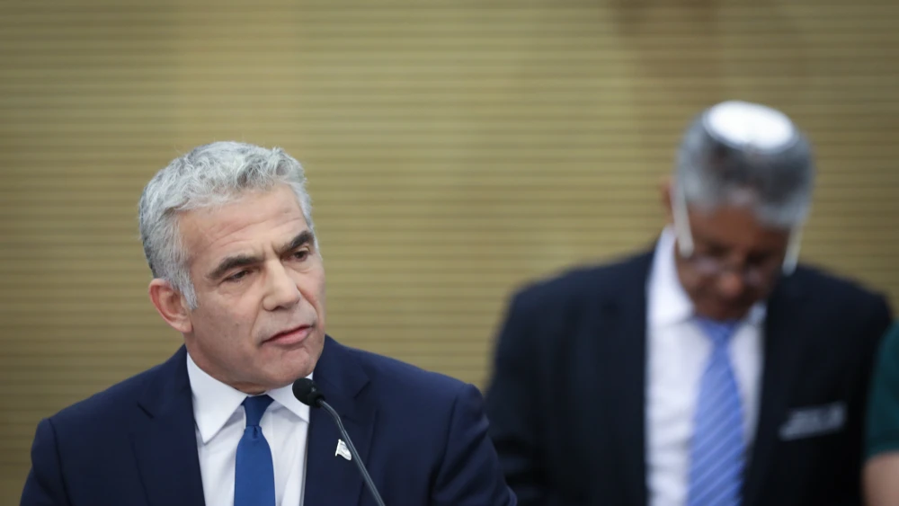 Blue and White co-chairman Yair Lapid, at the Knesset, during the opening session of the new Knesset, following elections, on April 30, 2019. Credit: Noam Revkin Fenton/Flash90.