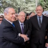 From left: Israel’s President Reuven Rivlin, Israeli Prime Minister Benjamin Netanyahu and Blue and White Party leader Benny Gantz, shake hands at the memorial ceremony for the late President Shimon Peres, at the Mount Herzl cemetery in Jerusalem, on Sept. 19, 2019. Photo by Yonatan Sindel/Flash90.