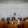 Acting President of the Israeli Supreme Court Uzi Vogelman and fellow justices arrive at a hearing in Jerusalem on June 18, 2023. Credit: Yonatan Sindel/Flash90.