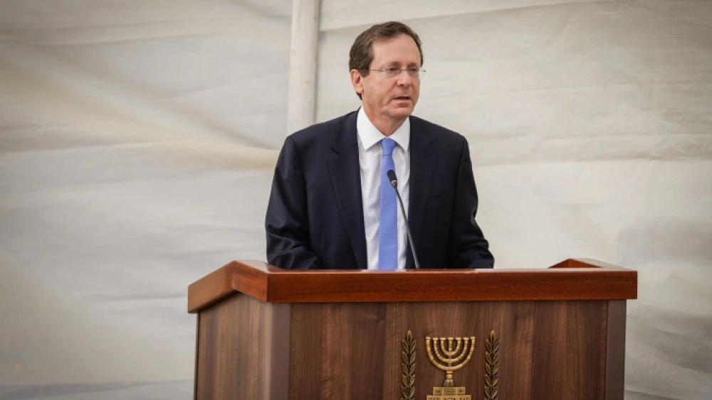Israel President-elect Isaac Herzog speaks during a memorial ceremony for Yonatan (“Yoni”) Netanyahu at the Mount Herzl Military Cemetery in Jerusalem on June 16, 2021. Photo by Olivier Fitoussi/Flash90.