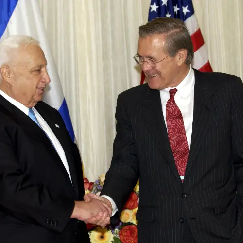 Former U.S. Defense Secretary Donald Rumsfeld with Israeli Prime Minister Ariel Sharon in October 2002. Credit: Avi Ohayon/GPO.