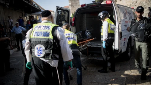 Israeli security forces and medics remove the body of a Palestinian man who stabbed two Israelis in the Old City of Jerusalem, on May 31, 2019. The attack occurred as Muslims marked the last Friday of the month of Ramadan. Photo by Yonatan Sindel/Flash90.