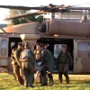 IDF soldiers rush injured Israelis to Soroka Hospital in Beersheva after evacuating them by helicopter on Aug. 26, 2014, following a mortar attack on Kibbutz Nirim near the Gaza border. Two Israeli men died from wounds they sustained in the incident, which took place shortly before the latest Israel-Hamas ceasefire deal went into effect. Photo by Flash90.