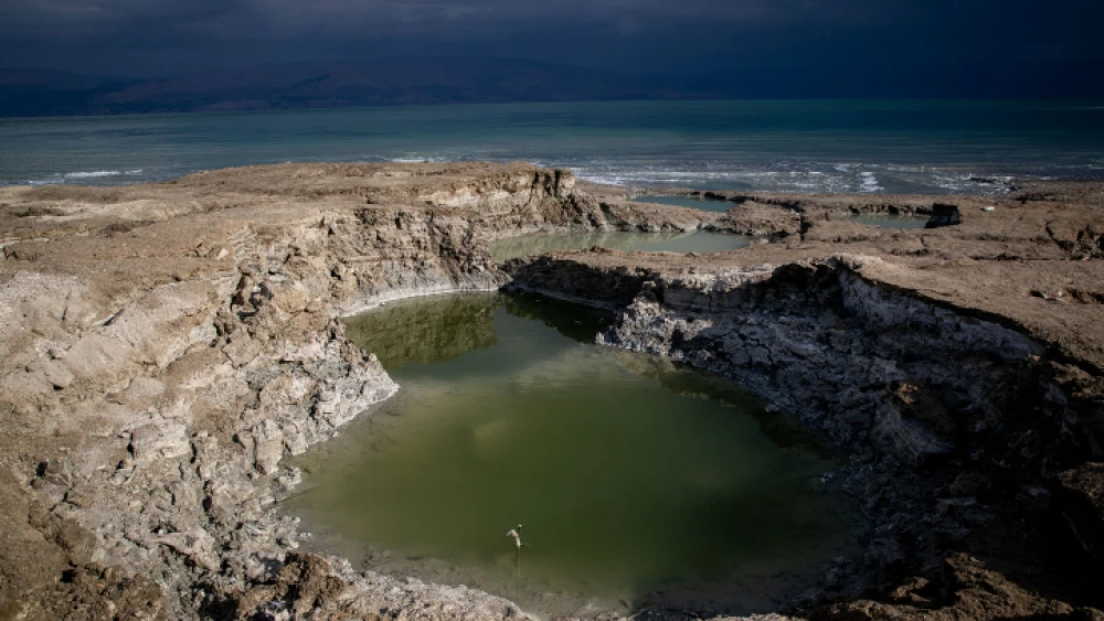 Sinkholes near the Dead Sea, formed by dissolution of underground salt by incoming freshwater, as a result of a continuing sea level drop, on Nov. 5, 2020. Photo by Yonatan Sindel/Flash90.