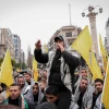 Fatah supporters gather for a rally ahead of the 60th anniversary of its establishment in Ramallah, Samaria