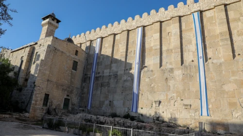 Israeli flags hangs on the walls of the Cave of the Patriarchs for Israel's 71st Independence Day, in the West Bank city of Hebron, May 8, 2019. Photo by Gershon Elinson/Flash90.