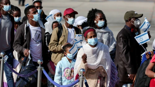New immigrants to Israel from Ethiopia's Jewish community arrive at Ben-Gurion International Airport as part of “Operation Tzur Israel” (“Rock of Israel”) on Dec. 3, 2020. Photo by Miriam Alster/Flash90.