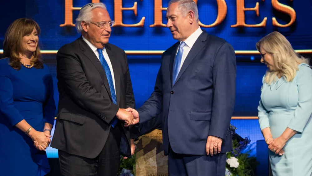 US Ambassador to Israel David Friedman and Prime Minister Benjamin Netanyahu at an event marking one year since the transfer of the US Embassy from Tel Aviv to Jerusalem and announcing the moving of the Ambassador's official residence to Jerusalem, on May 14, 2019. Photo by Yonatan Sindel/Flash90.
