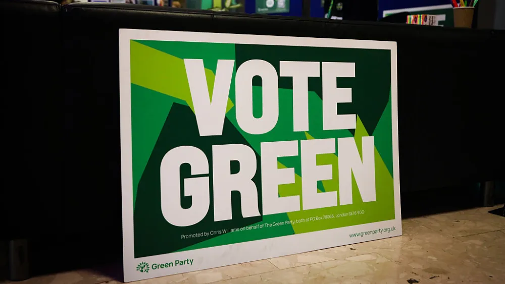 A “Vote Green” sign is pictured on day one of the Green Party annual conference in Brighton, England, Oct. 2, 2026. Photo by Alishia Abodunde/Getty Images