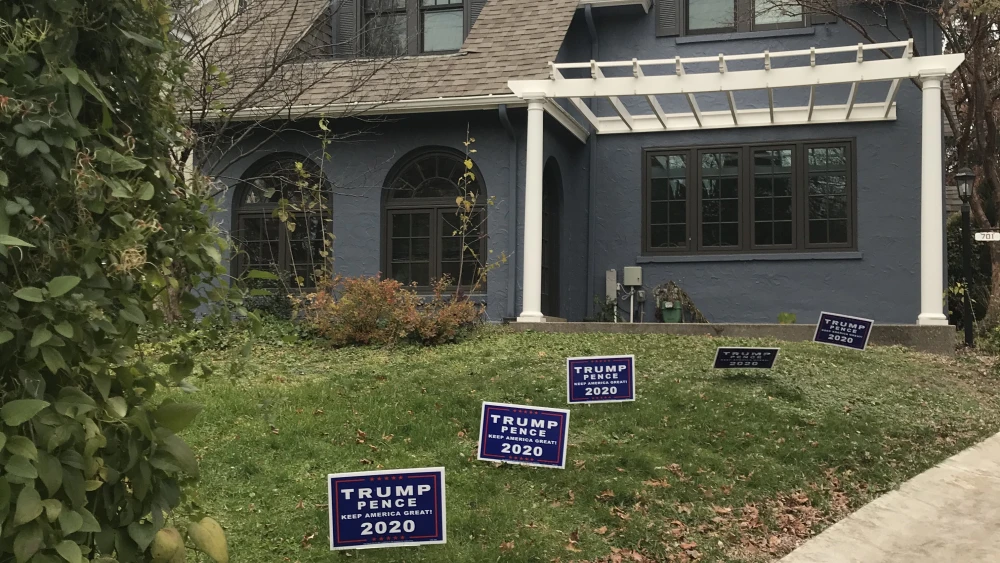 Lawn signs for U.S. President Donald Trump in Shadyside neighborhood of Pittsburgh. Photo by Heather Robinson.