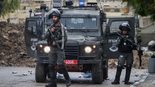 Israeli soldiers stand guard near the village of Burqa, Dec. 23, 2021. Photo by Nasser Ishtayeh/Flash90.