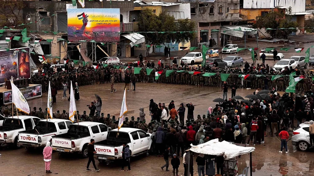 Palestinian terrorists prepare to release Israeli hostages in southern Gaza's Rafah, Feb. 22, 2025. Photo by Saeed Mohammed/Flash90.
