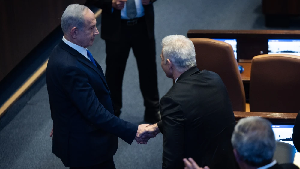 Prime Minister Benjamin Netanyahu with Leader of the Opposition Yair Lapid during a Special Session in his Honor of Albanian Prime Minister Edi Rama at the Knesset in Jerusalem, on Jan. 26, 2026. Photo by Yonatan Sindel/Flash90.