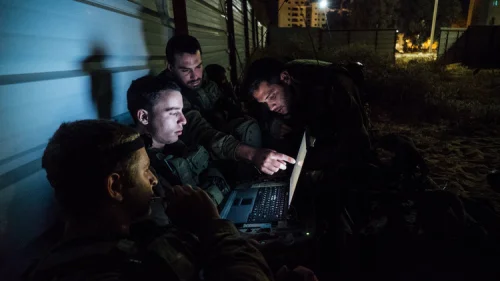 Artificial intelligence is being introduced at all levels of IDF decision-making. Pictured here, the Paratroopers Brigade during an exercise with other military units, including the elite canine unit Oketz. Credit: IDF via Flickr.