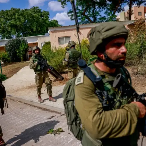 Israeli soldiers in Kibbutz Kfar Aza, near the Israeli-Gaza border in southern Israel, Oct. 10, 2023. Photo by Chaim Goldberg/Flash90.