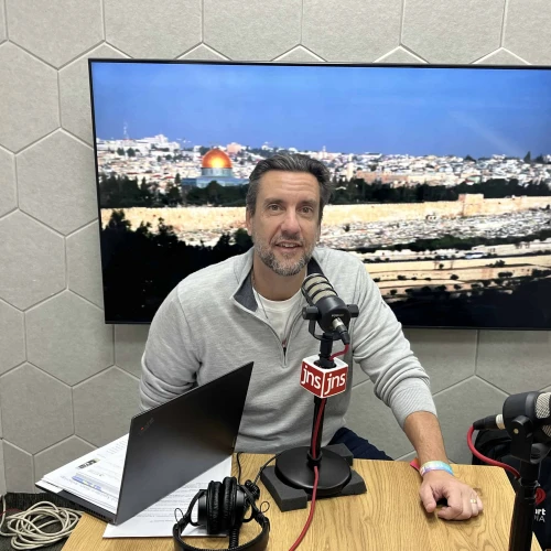 U.S. talk radio host Clay Travis broadcasts live from the JNS studios in Jerusalem.