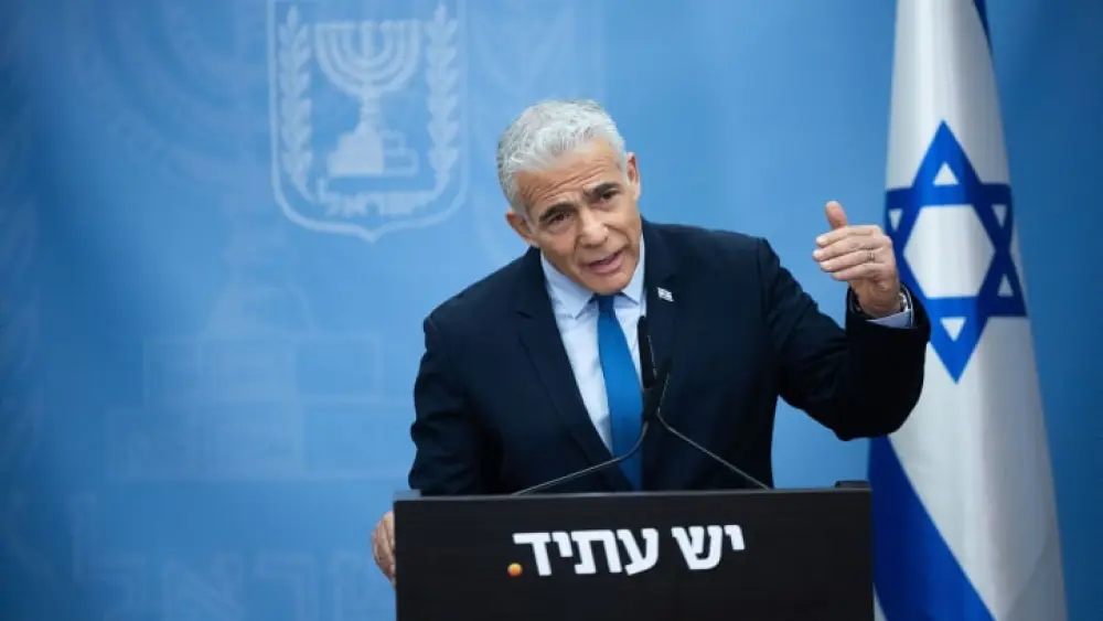 Head of the Yesh Atid party MK Yair Lapid speaks during a faction meeting at the Knesset, the Israeli parliament in Jerusalem, on July 3, 2023. Photo by Yonatan Sindel/Flash90 *** Local Caption *** ???? ???? ?? ???? ???? ????