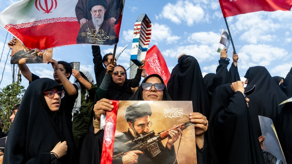 Mourners display images of Iran's slain Supreme Leader Ayatollah Ali Khamenei and his son and successor, Mojtaba Khamenei, during the third day of the elder Khamenei's funeral ceremonies in Tehran, Iran on July 6, 2026. Photo by Majid Saeedi/Getty Images.